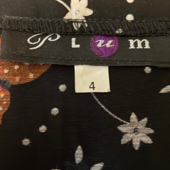 Plum knee length skirt - Picture 3 of 3